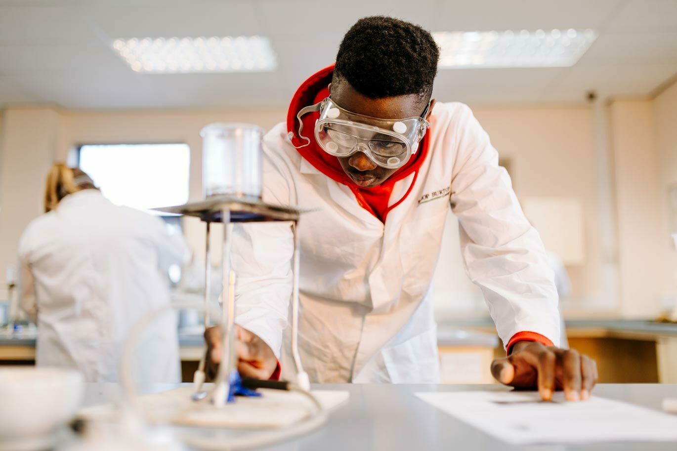 Forensic gallery Science student lighting bunsen burner