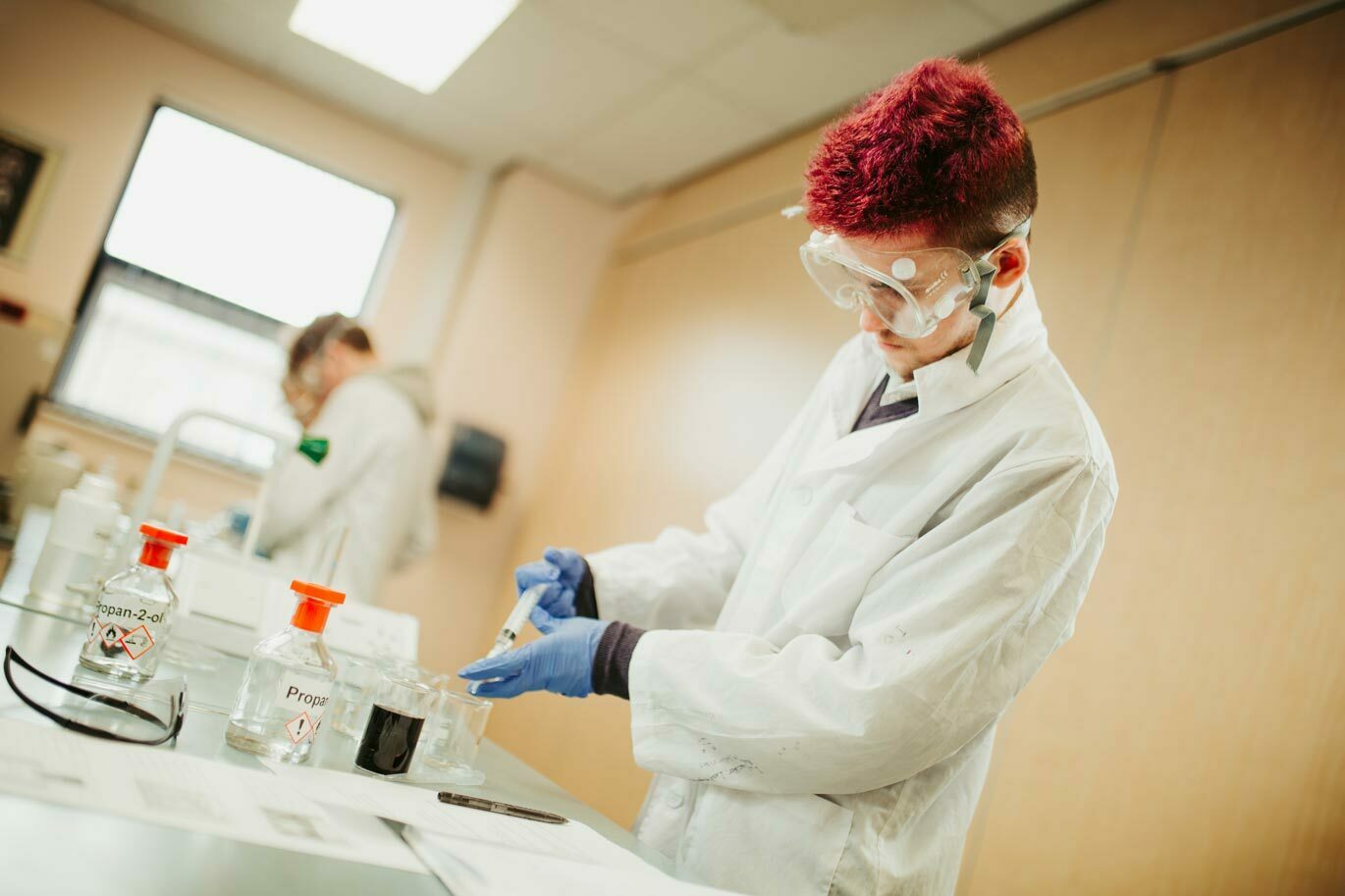 Forensic gallery Student conducting experiment in science lab